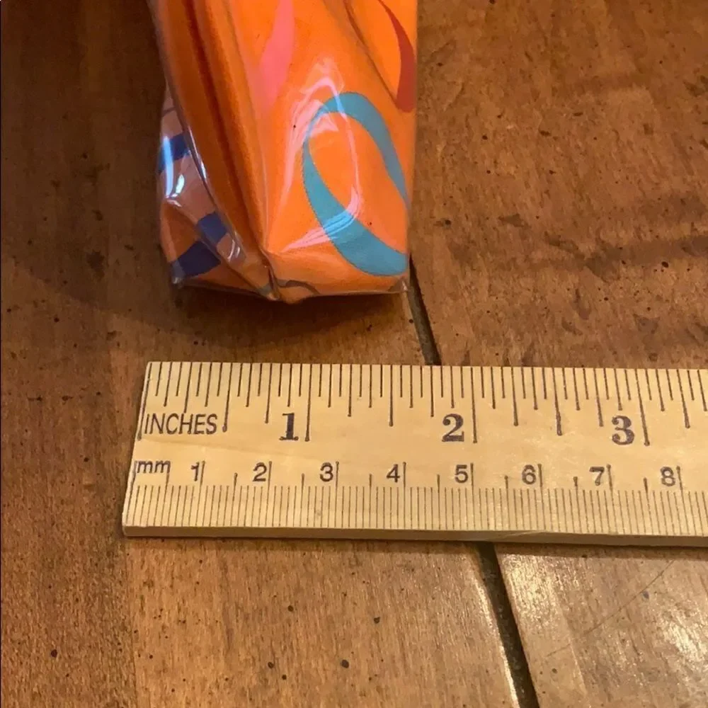 Never used Rare Oprah Orange O Logo Cosmetic bag.